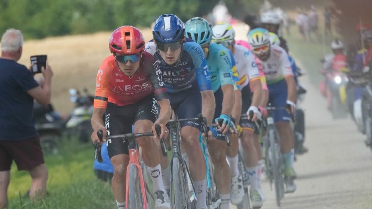 Britain's Thomas Pidcock, front, is followed by Canada's Derek Gee during the ninth stage of the Tour de France cycling race over 199 kilometers (123.7 miles) with start and finish in Troyes, France, Sunday, July 7, 2024. (Jerome Delay/AP Photo)