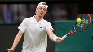 Denis Shapovalov of Canada plays a forehand return to Ben Shelton of the United States during their third round match at the Wimbledon tennis championships in London, Saturday, July 6, 2024. (Alberto Pezzali/AP)