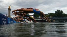 French Olympic champ, president defend Seine after controversial triathlon