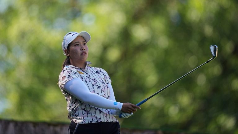 Chanettee Wannasaen, of Thailand, plays on the 2nd hole during the last round of the Evian Championship women's golf tournament, in Evian, eastern France, Sunday, July 14, 2024. (Laurent Cipriani/AP Photo)
