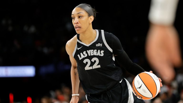 Las Vegas Aces centre A'ja Wilson takes the ball upcourt against the Dallas Wings during the second half of a WNBA basketball game Sunday, July 7, 2024, in Las Vegas. (Steve Marcus/Las Vegas Sun via AP)