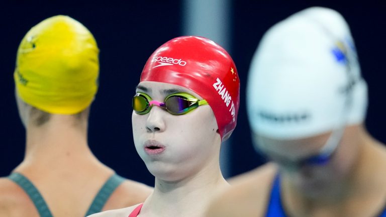 Zhang Yufei, of China, competes during a heat in the women's 100-meter butterfly at the 2024 Summer Olympics, Saturday, July 27, 2024, in Nanterre, France. (Ashley Landis/AP Photo)