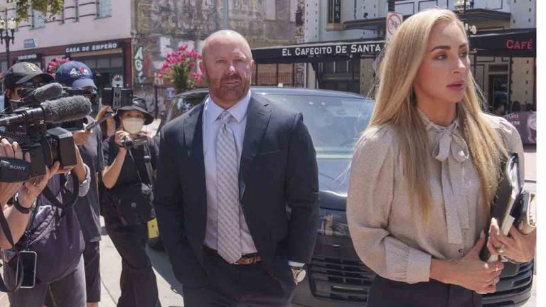 Mathew Bowyer, centre, a Southern California bookmaker, arrives at federal court in Santa Ana, Calif., Friday, Aug. 9, 2024. (Damian Dovarganes/AP)
