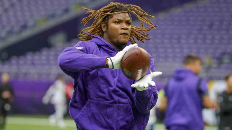 Minnesota Vikings safety Lewis Cine warms up prior to an NFL preseason football game against the Arizona Cardinals, Aug. 26, 2023, in Minneapolis. (Bruce Kluckhohn/AP)