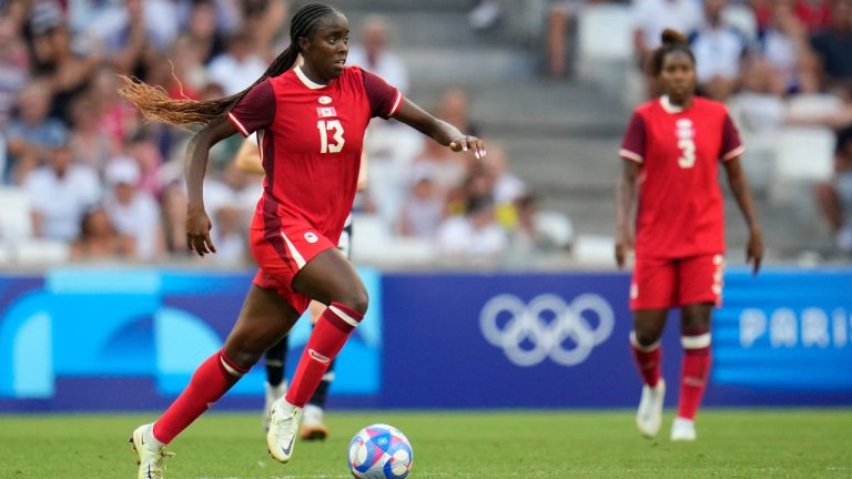 Midfielder Simi Awujo has joined fellow Canadian international Jayde Riviere at Manchester United. Awujo participates in a women's quarterfinal soccer match between Canada and Germany at the 2024 Summer Olympics, Saturday, Aug. 3, 2024, at Marseille Stadium in Marseille, France. (Julio Cortez/AP)