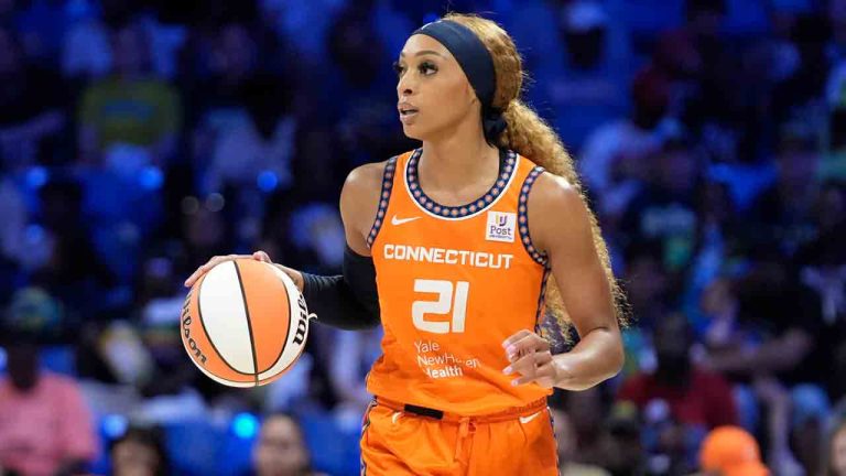 Connecticut Sun guard DiJonai Carrington (21) dribbles during the first half of a WNBA basketball basketball game against the Dallas Wings in Arlington, Texas, Saturday, June 15, 2024. (LM Otero/AP)