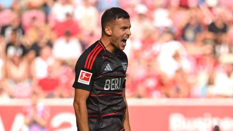Union's Laszlo Benes celebrates scoring during the Bundesliga soccer match between FSV Mainz 05 and 1. FC Union Berlin, at Mewa Arena, Mainz, Germany, Saturday Aug. 24, 2024. (Torsten Silz/dpa via AP)