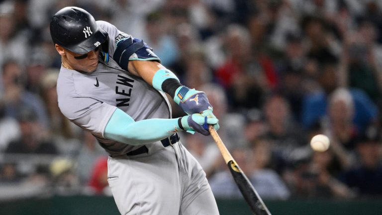 New York Yankees' Aaron Judge singles during the ninth inning of a baseball game against the Washington Nationals, Monday, Aug. 26, 2024, in Washington. (Nick Wass/AP) 