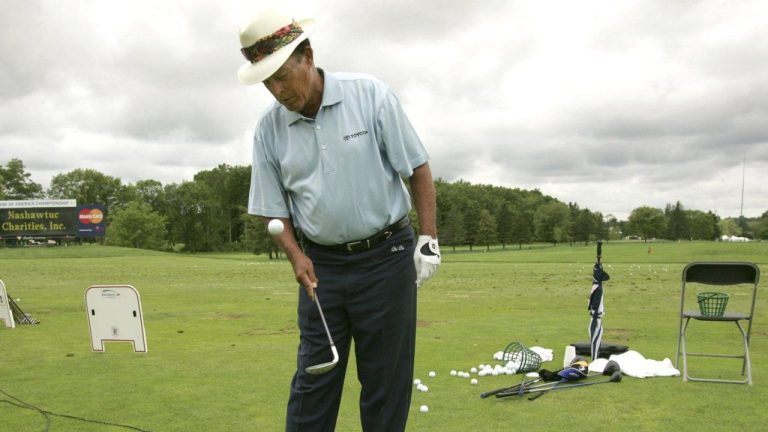 Golfer Chi Chi Rodriguez bounces a golf ball on the face of a golf club during a clinic at the driving range of the Nashawtuc Country Club, in Concord, Mass., Friday, June 9, 2006. (Steven Senne/AP Photo)
