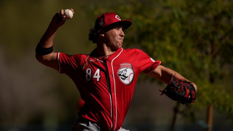 Cincinnati Reds pitcher Julian Aguiar throws a pitch during spring training baseball workouts in Goodyear, Ariz., on Wednesday, Feb. 14, 2024. (Carolyn Kaster/AP)