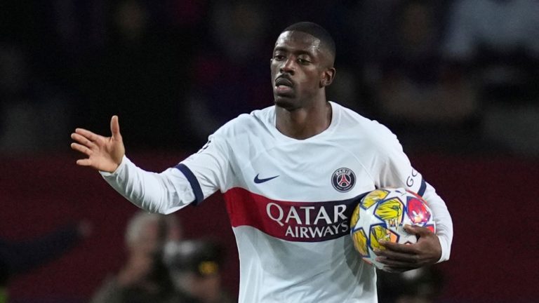 PSG's Ousmane Dembele celebrates after scoring his side's opening goal during the Champions League quarterfinal second leg soccer match between Barcelona and Paris Saint-Germain at the Olimpic Lluis Companys stadium in Barcelona, Spain, Tuesday, April 16, 2024. (Emilio Morenatti/AP Photo)
