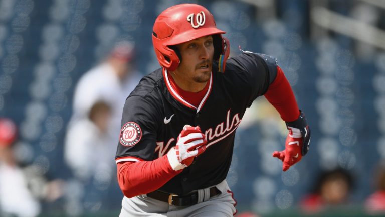Washington Nationals Futures' Dylan Crews runs towards first on his single during the third inning of an exhibition baseball game against the Washington Nationals, Tuesday, March 26, 2024, in Washington. (AP Photo/Nick Wass)