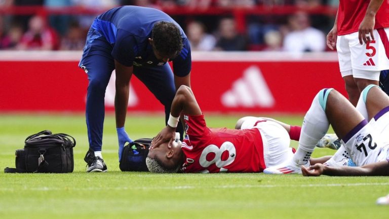 Nottingham Forest's Danilo receives treatment for an injury during the British Premier League soccer match between Nottingham Forest and AFC Bournemouth, at the City Ground, Nottingham, England, Saturday Aug. 17, 2024. (Mike Egerton/PA via AP)
