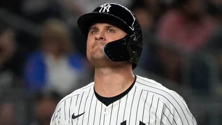 New York Yankees' J.D. Davis reacts after striking out during the sixth inning of a game against the New York Mets, July 24, 2024. (AP Photo/Pamela Smith)