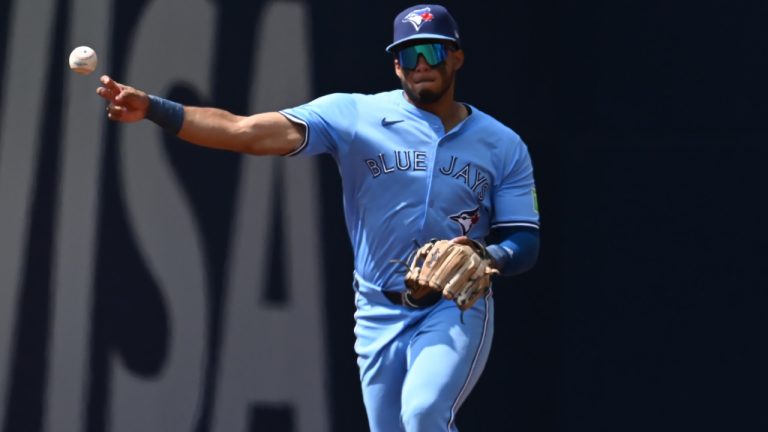 Toronto Blue Jays shortstop Leo Jimenez (49) throws to first base to put out Los Angeles Angels Zach Neto, not pictured, during first inning MLB baseball action in Toronto on Sunday, Aug 25, 2024. (Jon Blacker/CP)