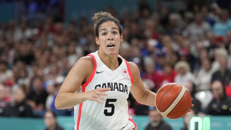 Kia Nurse, of Canada, plays against France in a women's basketball game at the 2024 Summer Olympics, Monday, July 29, 2024, in Villeneuve-d'Ascq, France. (AP Photo/Mark J. Terrill)