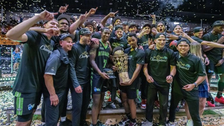 Members of the Niagara River Lions celebrate after clenching the championship at the final CEBL playoff game in Montreal, Sunday, Aug. 11, 2024. (Peter McCabe/CP)
