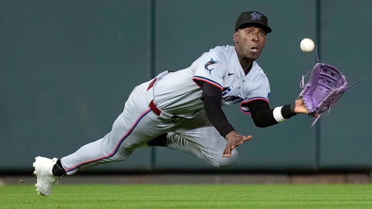 Miami Marlins center fielder Nick Gordon makes a diving catch on a fly ball hit by Houston Astros' Alex Bregman during the seventh inning of a baseball game Thursday, July 11, 2024, in Houston. (AP/Kevin M. Cox)