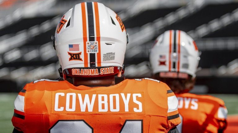 This photo provided by Oklahoma State Athletics shows a QR code on an Oklahoma State NCAA college football helmet, Thursday, Aug. 15, 2024, at Boone Pickens Stadium in Stillwater, Okla. (Bruce Waterfield/OSU Athletics via AP)