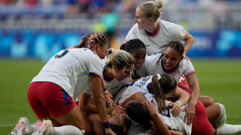 United States' Sophia Smith celebrates with team mates the opening goal during a women's semifinal soccer match between the United States and Germany at the 2024 Summer Olympics, Tuesday, Aug. 6, 2024, at Lyon Stadium in Decines, France. (AP/Silvia Izquierdo)