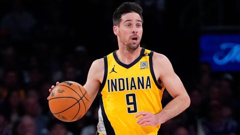 Indiana Pacers guard T.J. McConnell (9) dribbles during the first half of Game 7 in an NBA basketball second-round playoff series against the New York Knicks, Sunday, May 19, 2024, in New York. The Pacers won 130-109. (AP Photo/Julia Nikhinson)