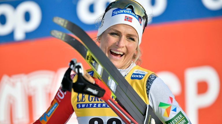 Norway's Therese Johaug celebrates her victory in the women's cross-country skiing classic style 10km competition, of the FIS Nordic World Cup Lahti Ski Games in Lahti, Finland, Sunday, Feb. 27, 2022. (Antti Yrjonen/Lehtikuva via AP)