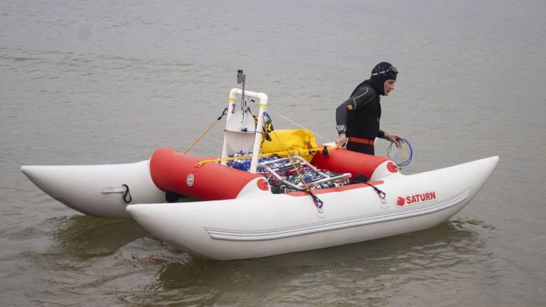 Jim Dreyer heads out into Lake Michigan in Grant Haven, Mich., Aug. 6, 2024, in his attempt to swim to Wisconsin. (AP)