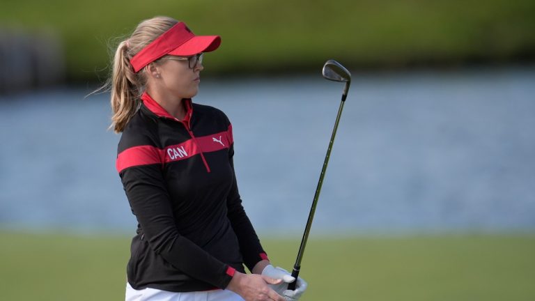 Brooke Henderson, of Canada, reacts after putting on the 2nd green during the first round of the women's golf event at the 2024 Summer Olympics, Wednesday, Aug. 7, 2024, at Le Golf National in Saint-Quentin-en-Yvelines, France. (George Walker IV/AP Photo)