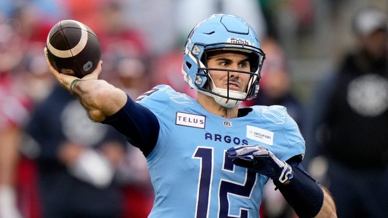 Toronto Argonauts quarterback Chad Kelly (12) makes the pass during first half CFL Eastern Division final football action against the Montreal Alouettes, in Toronto, Saturday, Nov. 11, 2023. (Frank Gunn/CP)