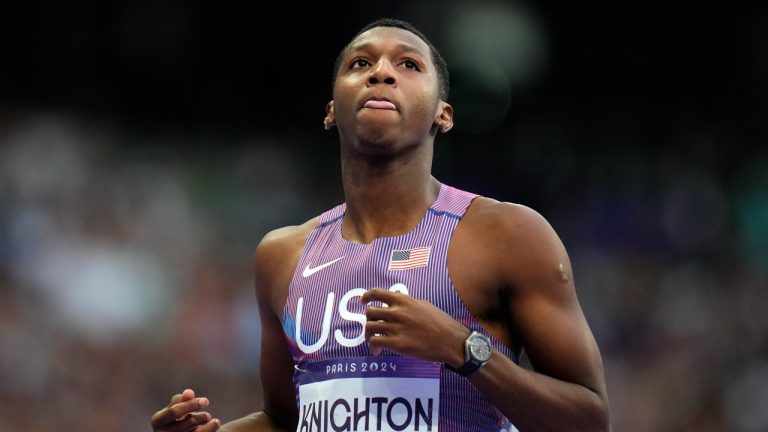 Erriyon Knighton, of the United States, reacts following his men's 200-metre semifinal at the 2024 Summer Olympics, Wednesday, Aug. 7, 2024, in Saint-Denis, France. (Petr David Josek/AP Photo)