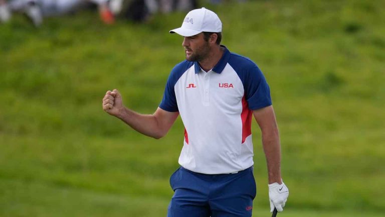 Scottie Scheffler, of the United States, reacts after making a birdie on the 2nd green during the final round of the men's golf at the 2024 Summer Olympics, Sunday, Aug. 4, 2024, at Le Golf National. (George Walker IV/AP)