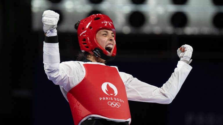 Canada's Skylar Park celebrates after defeating Laetitia Aoun to win the bronze medal in the women's 57kg taekwondo at the Summer Olympics, Thursday, August 8, 2024 in Paris. (Adrian Wyld/THE CANADIAN PRESS)