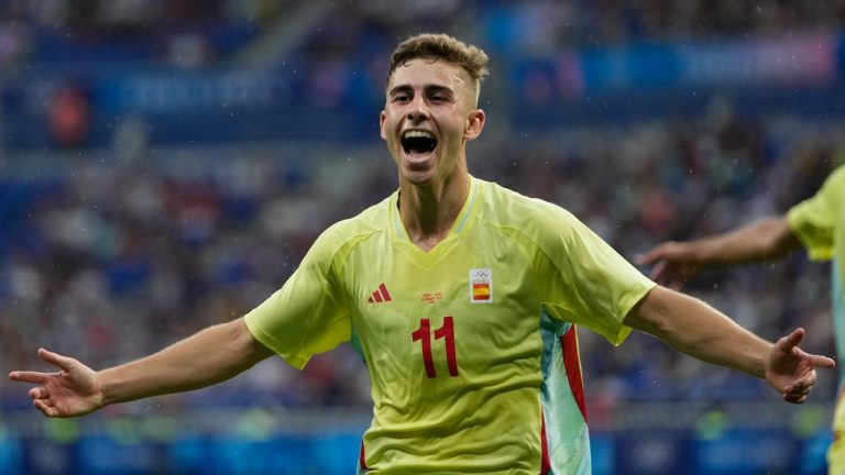 Spain's Fermin Lopez celebrates after scoring his side's 2nd goal during the men's quarter final soccer match between Japan and Spain at the Lyon stadium during the 2024 Summer Olympics, Friday, Aug. 2, 2024, in Decines, France. (Silvia Izquierdo/AP Photo)
