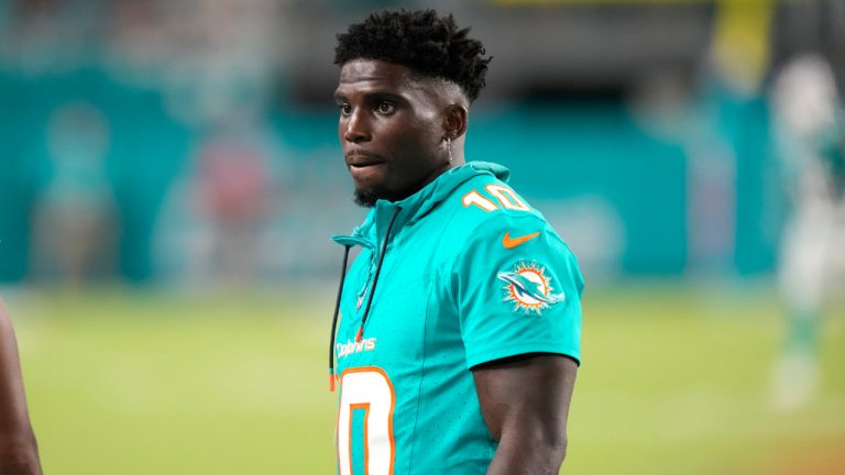 Miami Dolphins wide receiver Tyreek Hill watches from the sideline during the second half of a preseason NFL football game against the Washington Commanders, Saturday, Aug. 17, 2024, in Miami Gardens, Fla. (Wilfredo Lee/AP)