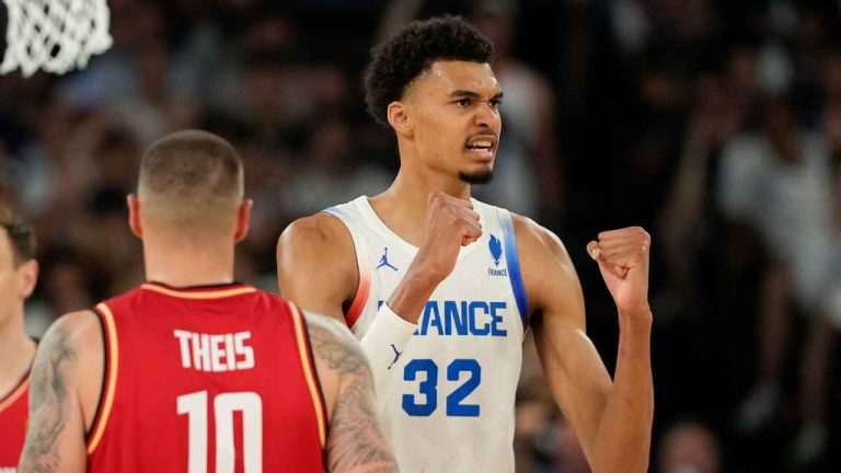 Victor Wembanyama (32), of France celebrates a basket against Germany during a men's semifinals basketball game at Bercy Arena at the 2024 Summer Olympics. (Mark J. Terrill/AP)