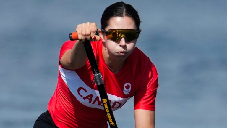Katie Vincent, of Canada, competes in the women's canoe single 200-metre heats at the 2024 Summer Olympics, Thursday, Aug. 8, 2024, in Vaires-sur-Marne, France. (Ebrahim Noroozi/AP Photo)