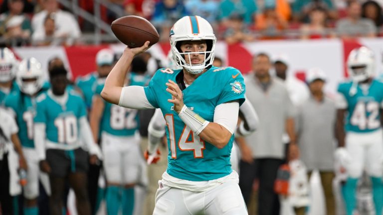 Miami Dolphins quarterback Mike White (14) aims a pass during the first half of a pre-season NFL football game against the Tampa Bay Buccaneers, Friday, Aug. 23, 2024, in Tampa, Fla. (Jason Behnken/AP)