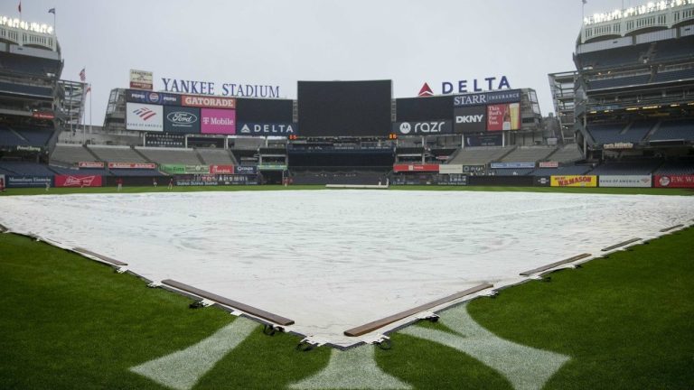A tarp covers the field at Yankee Stadium before a baseball game between the New York Yankees and the Los Angeles Angels, Thursday, Aug. 8, 2024, in New York. (Bryan Woolston/AP)