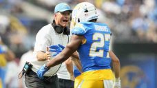Dobbins rushes for 135 yards, Chargers beat Raiders in Jim Harbaugh’s debut