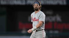 Dodgers clinch top seed in National League as Phillies lose to Nationals