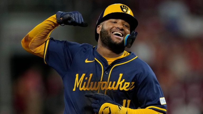 Milwaukee Brewers left fielder Jackson Chourio celebrates as he rounds the bases after hitting a home run during the ninth inning of a baseball game against the Cincinnati Reds, Saturday, Aug. 31, 2024, in Cincinnati. (Carolyn Kaster/AP Photo)