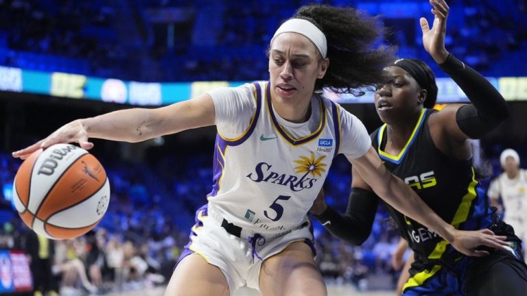 Los Angeles Sparks forward Dearica Hamby tries to keep the ball away from Dallas Wings guard Arike Ogunbowale during the second half of a WNBA basketball game in Arlington, Texas, Sunday, Aug. 25, 2024, (LM Otero/AP Photo)