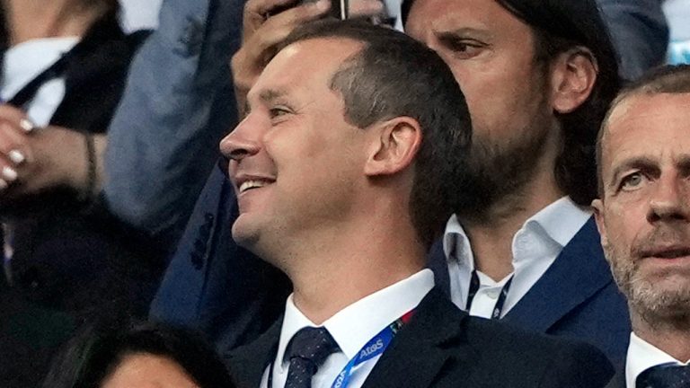 UEFA's deputy general secretary Kevin Lamour, centre, looks on as he stands next to UEFA President Aleksander Ceferin, right, prior to the start of a Group F match between Turkey and Georgia at the Euro 2024 soccer tournament in Dortmund, Germany, Tuesday, June 18, 2024.  (AP/Alessandra Tarantino, File)