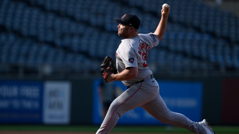 Boston Red Sox pitcher Liam Hendriks throws during warmups before a baseball game against the Kansas City Royals, Tuesday, Aug. 6, 2024, in Kansas City, Mo. (AP/Reed Hoffmann)