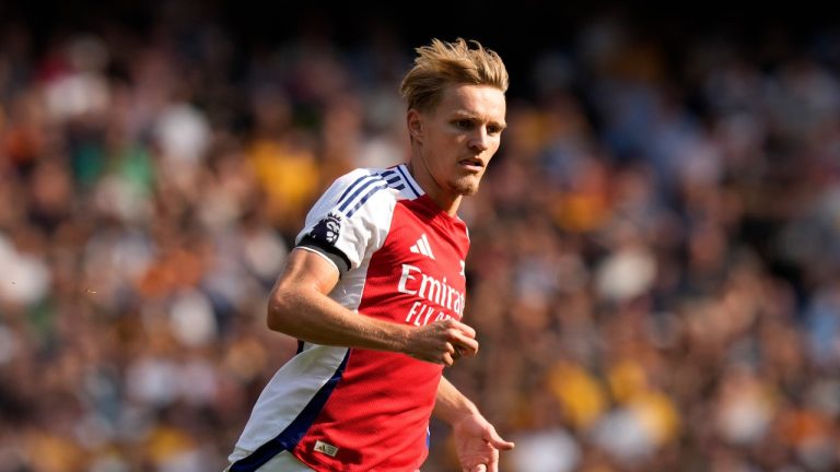 Arsenal's Martin Odegaard in action during the English Premier League soccer match between Arsenal and Wolverhampton Wanderers at Emirates Stadium in London, England, Saturday, Aug. 17, 2024. (AP/Frank Augstein)