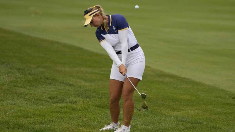 Europe's Emily Pedersen hits from the fifth fairway during a Solheim Cup golf tournament singles match at the Robert Trent Jones Golf Club. (Matt York/AP)