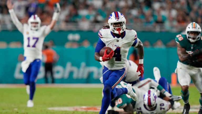 Buffalo Bills running back James Cook (4) runs for a touchdown during the first half of an NFL football game against the Miami Dolphins, Thursday, Sept. 12, 2024, in Miami Gardens, Fla. (Lynne Sladky/AP)