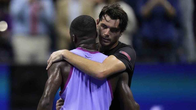 Taylor Fritz, of the United States, hugs Frances Tiafoe, of the United States, after winning the men's singles semifinals of the U.S. Open tennis championships, Friday, Sept. 6, 2024, in New York. (Kirsty Wigglesworth/AP)