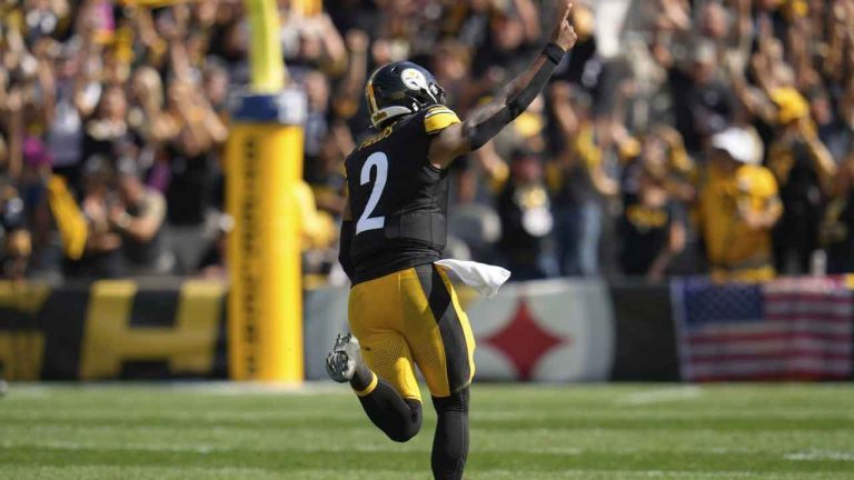 Pittsburgh Steelers quarterback Justin Fields celebrates after throwing a touchdown pass to wide receiver Calvin Austin III during the second half of an NFL football game against the Los Angeles Chargers. (Gene J. Puskar/AP)