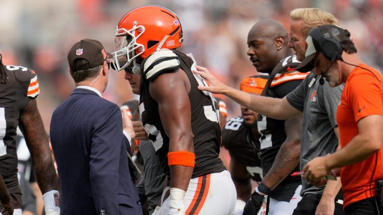 Cleveland Browns' Myles Garrett is helped off the field after an injury in the second half of an NFL football game against the New York Giants, Sunday, Sept. 22, 2024, in Cleveland. (Sue Ogrocki/AP)